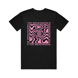 image of a black tee shirt on a white background. tee has a full center chest print in pink of a square with an eye ball in the center and wavy pattern around it. on the outside of the square on each side says the menzingers