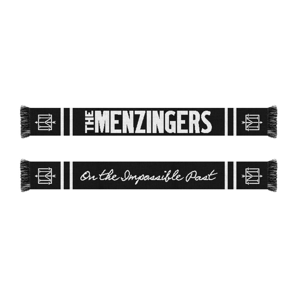 image of the front and back of a black scarf on a white background. top shows one side of the scarf with white threads that says the menzingers. the bottom shows the other side with white thread that says on the impossible past. each end near the fringe has the T M emblem.